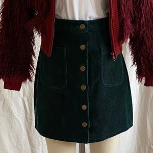 Green corduroy mini skirt